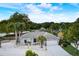 Single Gathering home with gray exterior and white driveway at 3822 75Th E Ter, Sarasota, FL 34243