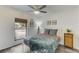 Cozy bedroom with a full-size bed and large window at 3822 75Th E Ter, Sarasota, FL 34243