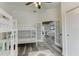 Bedroom with twin bunk beds and access to another room at 3822 75Th E Ter, Sarasota, FL 34243