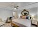 Large main bedroom with king-size bed and built-in shelving at 3822 75Th E Ter, Sarasota, FL 34243