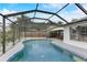 This screened pool has a large patio perfect for entertaining at 3822 75Th E Ter, Sarasota, FL 34243