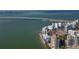 Waterfront condo building aerial view at 400 Golden Gate Pt # 11, Sarasota, FL 34236