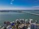 Wide shot of waterfront condo building at 400 Golden Gate Pt # 11, Sarasota, FL 34236