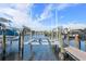 Private boat lift provides convenient access to the waterway at 4110 Commodore Blvd, Cortez, FL 34215
