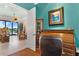 Home office with built-in rolltop desk and water views at 4110 Commodore Blvd, Cortez, FL 34215