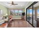 Living Room with water views and access to patio at 4110 Commodore Blvd, Cortez, FL 34215