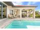 Inviting pool and patio area, perfect for outdoor relaxation and entertaining at 4110 Commodore Blvd, Cortez, FL 34215
