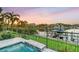 Relaxing spa with a waterfall feature overlooking the canal at 4110 Commodore Blvd, Cortez, FL 34215