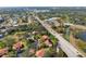 Aerial image showcasing villas, roads, and a waterway at 4351 Trails Dr # 4-2, Sarasota, FL 34232