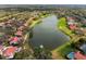 Aerial view of community near a tranquil lake at 4351 Trails Dr # 4-2, Sarasota, FL 34232