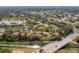 Aerial close-up of a villa in a community by the water at 4351 Trails Dr # 4-2, Sarasota, FL 34232