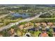 Aerial close-up of a villa in a community by the water at 4351 Trails Dr # 4-2, Sarasota, FL 34232