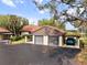 Two-car garage with covered parking and additional storage at 4351 Trails Dr # 4-2, Sarasota, FL 34232