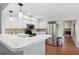 Modern kitchen with stainless steel appliances and white cabinetry at 4351 Trails Dr # 4-2, Sarasota, FL 34232