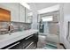 Modern bathroom with double vanity and walk-in shower at 4679 Country Manor Dr, Sarasota, FL 34233