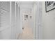 Hallway with multiple closets and access to rooms at 4705 Sand Trap Street E Cir # 106, Bradenton, FL 34203