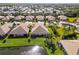 Aerial view of community near a lake at 4891 Maymont Park Cir, Bradenton, FL 34203