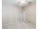 Large bedroom with ceiling fan, closet, and neutral wall paint at 4891 Maymont Park Cir, Bradenton, FL 34203