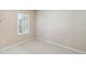 Well-lit bedroom featuring carpet, window with shutters, and neutral wall colors at 4891 Maymont Park Cir, Bradenton, FL 34203