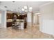 Spacious kitchen with island, stainless steel appliances, and granite countertops at 4891 Maymont Park Cir, Bradenton, FL 34203