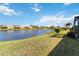 Peaceful lake view from the backyard at 4891 Maymont Park Cir, Bradenton, FL 34203