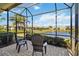 Spacious screened patio with lake view at 4891 Maymont Park Cir, Bradenton, FL 34203