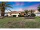 This home features a large backyard with mature landscaping and a relaxing patio area at 5061 Seagrass Dr, Venice, FL 34293