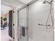 Walk-in shower with glass enclosure and grab bars at 5061 Seagrass Dr, Venice, FL 34293