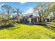 Backyard view of home with lush lawn at 5269 Myrtle Wood Rd # 35, Sarasota, FL 34235