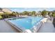 Community pool with plenty of lounge chairs at 5269 Myrtle Wood Rd # 35, Sarasota, FL 34235