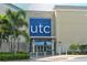 UTC shopping center entrance with palm trees and modern design at 5269 Myrtle Wood Rd # 35, Sarasota, FL 34235