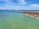 Aerial view of bridge and shoreline with city skyline in the background at 531 N Spoonbill Dr, Sarasota, FL 34236