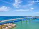 Aerial view of a bridge spanning a body of water with cityscape in background at 531 N Spoonbill Dr, Sarasota, FL 34236