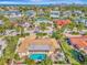 Aerial view of waterfront home and neighborhood at 531 N Spoonbill Dr, Sarasota, FL 34236