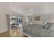 Main bedroom with pool view, white furniture, and sliding glass doors at 531 N Spoonbill Dr, Sarasota, FL 34236