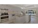 Modern kitchen featuring granite countertops and stainless steel appliances at 531 N Spoonbill Dr, Sarasota, FL 34236