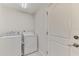 Functional laundry room with washer and dryer at 531 N Spoonbill Dr, Sarasota, FL 34236