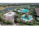 Aerial view of resort-style pool, playground, and community at 5337 Popoli Way, Sarasota, FL 34238