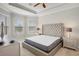 Spacious bedroom with large bed and neutral decor at 5337 Popoli Way, Sarasota, FL 34238