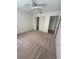 Spacious bedroom with carpeting and closet at 5345 Pamela Wood Way, Sarasota, FL 34233