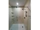 Shower stall with glass enclosure and grab bar at 5345 Pamela Wood Way, Sarasota, FL 34233