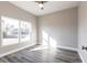 Well-lit bedroom featuring wood-look floors at 5534 Fairlane Dr, North Port, FL 34288