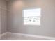 Spacious closet with built-in shelving and a window at 5534 Fairlane Dr, North Port, FL 34288