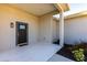 Dark brown front door with glass accents at 5534 Fairlane Dr, North Port, FL 34288