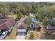 Aerial view of home, showcasing its backyard and location at 5574 Sweetwater Oak, Sarasota, FL 34232