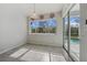 Bright breakfast nook with view of backyard pool at 5574 Sweetwater Oak, Sarasota, FL 34232