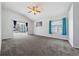 Main bedroom with carpet, sliding glass doors, and pool view at 5574 Sweetwater Oak, Sarasota, FL 34232