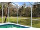 Enjoy the view from this screened pool area at 5574 Sweetwater Oak, Sarasota, FL 34232