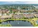 Aerial view of condos near a lake at 5612 Ashton Lake Dr # 5612, Sarasota, FL 34231