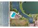 Aerial view of pool, road and building at 5612 Ashton Lake Dr # 5612, Sarasota, FL 34231